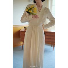 An elegant long dress that looks like the main character of a 1980s movie. The upper body has a pleated design, and the waist part has a complicated structure that looks like hanging fabric. An item with an elegant drape that gives a gorgeous impression. 
 
 
 Size 
 
 XS size 
 
 Length: 123cm 
 Shoulder width: 38cm 
 Bust: within 90cm 
 Waist: within 63cm 
 Hip: within 92cm 
 Sleeve length: 56cm 
 
 S size 
 
 Length: 128cm 
 Shoulder width: 40cm 
 Bust: within 94cm 
 Waist: within 67cm 
 Hip: Formal Beige Midi Length Pleated Dress, Formal Beige Pleated Dress, Formal Draped Maxi Dress With Folds, Formal Pleated Draped Maxi Dress, Formal Beige Midi Dress With Pleated Waist, Floor-length Pleated Maxi Dress For Dinner, Pleated Draped Maxi Dress For Formal Occasions, Pleated Floor-length Maxi Dress For Dinner, Beige Formal Dress With Pleated Waist