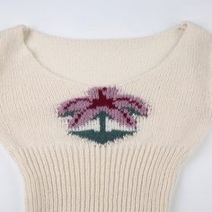 Introducing the Maiya Palm Knit Sweater, a perfect blend of cozy comfort and playful style. Crafted from soft, high-quality knit fabric, this sweater offers a snug fit that flatters your figure while keeping you warm. The standout feature is the charming palm tree design embroidered on the front, adding a touch of whimsy to your everyday look. The off-white color makes it versatile, easy to pair with your favorite jeans or skirts for a chic, laid-back ensemble. With its long sleeves and subtle s Beige Crew Neck Knit Cardigan, Beige Knit Crew Neck Cardigan, Fitted Beige Crew Neck Sweater, Beige Fitted Crew Neck Sweater, White Stretch Knit Top For Winter, Fitted White Cotton Sweater, Fitted Cotton Cream Sweater, Crew Neck Cotton Knitted Top, Crew Neck Cotton Knit Top