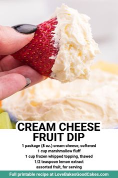 a hand holding a strawberry with cream cheese on it and text overlay that reads, cream cheese fruit dip