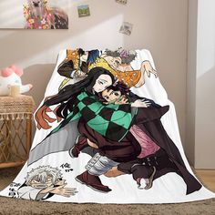 the anime characters are hugging on this blanket