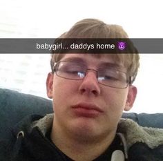 a young man wearing glasses is looking at the camera with an instagram message above his head