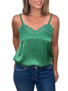 So many options. With this lace camisole you can layer, wear as a top or it can double as sleepwear. Any way you choose to wear it, the silky satin fabric feels good, wears well and will be a much appreciated staple in your wardrobe. Details: Adjustable Strap Elastic backing Loose hem Material 70% Viscose 30% Silk One size fits most Made in Italy Care Hand wash No bleach Hang dry Iron low heat Spring Satin Top With Lace Trim, Green Lace Camisole Top, Satin Lace Top For Spring, Green Satin Camisole For Summer, Summer Green Satin Camisole, Green Lace Cami Top, Elegant Green Satin Camisole, Casual Satin Camisole, Green Casual Camisole With Lace Trim