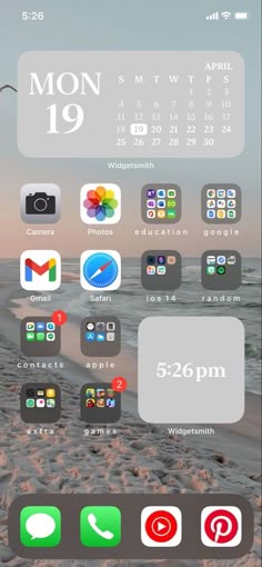 an iphone screen with the date and time displayed on it, along with other icons