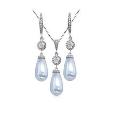 "Swarovski Light Blue Drop Pearl Necklace and Earrings Jewelry Set A beautiful jewelry set perfect for the bride, mother of the bride, mother of the groom, bridesmaids, maid of honor, matron of honor or wedding guests for a black themed wedding.  Also a perfect gift or accessory for prom, birthday or anniversary parties. EARRINGS AND NECKLACE CAN BE PURCHASED SEPARATELY OR AS A SET. Materials: 15mm x 8mm Swarovski Long Drop Pearls.   Rhodium Plated Sterling Silver Necklace Chain Rhodium Plated B Blue Prom Jewelry, Black Themed Wedding, Light Blue Prom, Sky Blue Prom Dress, Mother Of The Bride Jewelry, Blue Earrings Wedding, Pearl Wedding Jewelry Sets, Pale Blue Wedding, Pearl Wedding Jewelry