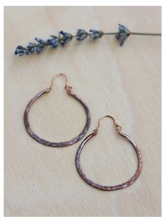 Lovable thick hoops handmade to last in solid copper, sterling silver, brass or titanium wire. Hand forged, and oxidized to highlight textures, and comfy for everyday wear! Great look as is or add some dangles to an extra spark! This textured copper hoops are crafted from 12 gauge wire. Shaped, drilled, hammered, textured and oxidized by hand. ♥ You will receive a set of 2 hammered hoops of 1 inch (25 mm) or 1 1/2 inches (30 mm) inside diameter. Please select from menu. ♥ The texture on these ar Boho Hoop Earrings, Hammered Hoop Earrings, Oxidized Copper, 12 Gauge, Earrings Boho, Hand Forged, Boho Earrings, Infinity Bracelet, Etsy Australia