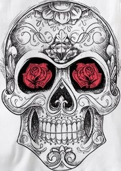 a skull with red eyes and roses on it