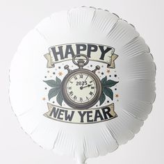 a white balloon with a happy new year clock on it