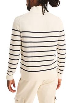 This striped sweater is just what your cool-weather wardrobe needs. Its made from a soft cotton knit and features a 1/4-zip front, ribbed cuffs, and Nautica's J-class icon at the chest. From Nautica's Navtech collection, it is the perfect sweater for lifes daily adventures. With Navtech, innovative fabrics meet functional design to inspire movement and optimize performance. 1/4-zip closure Ribbed mock neck Long sleeves Ribbed cuffs and hem J-class icon at chest Classic fit Breathable fabric ensures all-day comfort With Navtech, innovative fabrics meet functional design to inspire movement and optimize performance | Nautica Men's Navtech Striped 1/4 Zip Sweater, Large Perfect Sweater, 1/4 Zip Sweater, Striped Sweater, Zip Sweater, Cotton Knit, Functional Design, 1/4 Zip, Mock Neck, Breathable Fabric