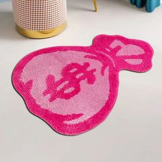 a pink rug with a cartoon character on it