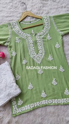 DESCRIPTION Kurti Fabric : Rayon Sleeves : 3/4 Sleeves Style : Tunic Top Occasions : Casual Wear, Office Wear, Festive Wear Garment Care : Hand Wash Only Price Includes : 1x Kurti and Pant Note : Embroidery and design may be little vary due to various human hand involvement. Fabric will be same. Will share image before dispatch. Traditional Pista Green Palazzo Set For Spring, Traditional Green Pant Set With Resham Embroidery, Traditional Pant Set With Floral Embroidery For Festivals, Traditional Floral Embroidery Pant Set For Festivals, Traditional Embroidered Green Pant Set, Festive Green Pant Set With Chikankari Embroidery, Traditional Pista Green Sharara For Spring, Traditional Spring Sharara With Cutdana, Traditional Cutdana Sharara For Spring