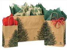 three bags with christmas trees on them