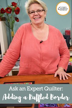 a woman sitting at a desk with the words ask an expert quilter can i free motion quilt on a regular sewing machine?