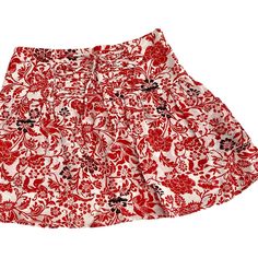 White Red Black Floral Pull-On Layered Mini Skirt Adjustable Tie Front Detail Hidden Size Zip Closure Fully Lined Lightweight Made In Usa Women's Size Small, Medium, Large Approximate Flat Lay Measurements: Sm: 13" Waist 15" Length Md: 14" Waist 15.5" Length Lg: 15" Waist 16" Length 100% Rayon Brand New Boutique Mini Skirt Without Tags From Wholesaler. Individually Packaged. Chic Red Floral Print Mini Skirt, Red Tiered Mini Skirt With Lining, Red Casual Skirt With Floral Print, Casual Red Floral Print Skirt, Chic Red Mini Skirt With Floral Print, Casual Red Skirt With Floral Print, Red Flowy Casual Mini Skirt, Red Tiered Mini Skirt For Spring, Red Flowy Tiered Mini Skirt