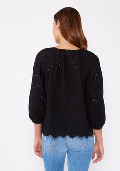 A classic cotton bohemian blouse with embroidered eyelet details. Embroidered eyelet Relaxed fit 3/4 length sleeve Button cuff closure Split v-neckline with ties Scalloped hem Not lined Bohemian blouse An ultra-charming cotton blouse for summer! Tackle the heat wave with our comfortable yet stylish embroidered eyelet top, designed with an unlined fabric for an airy and breezy feel. Featuring 3/4 length sleeves, button cuff closure, and a split v-neckline with ties. We like to pair this effortles Cotton Blouse With Cutwork Hem For Daywear, Long Sleeve Blouse For Daywear With Cutwork Hem, Casual Cotton Blouse With Cutwork Hem, Cotton Eyelet Blouse With Relaxed Fit, Cotton Blouse With Broderie Anglaise In Relaxed Fit, Long Sleeve Broderie Anglaise Blouse With Relaxed Fit, Long Sleeve Blouse With Broderie Anglaise In Relaxed Fit, Long Sleeve Broderie Anglaise Blouse In Relaxed Fit, Cotton Tops With Chikankari Embroidery For Fall