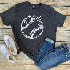 "Show your team spirit with one of our game day sports tees!! These soft and comfy tees are our go-to shirt, we use Bella + Canvas tees for top quality products by Alphabet Soup! Shirts are UNISEX fit Bella + Canvas jersey tees. Looking for a different style tee? V-neck, ladies fit, youth...just ask! We can get it, prices may vary with style. To purchase: ~Choose your color and size from the drop box. ~Looking for a different color or style shirt? Just ask! We can almost always find what you are Sports Fan T-shirt For Baseball Season, Sports Fan T-shirt With Team Name For Baseball Season, Casual Athletic Heather T-shirt For Game Day, Cotton T-shirt For Baseball Game Day, Tri-blend Fan Apparel T-shirt For Game Day, Sporty T-shirt For Game Day During Football Season, Game Day T-shirt With Screen Print For Sports Season, Team Logo T-shirt For Baseball Game Day, Pre-shrunk Athletic Heather T-shirt For Game Day