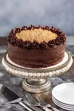 a chocolate cake sitting on top of a table