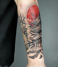 a person with a tattoo on their arm