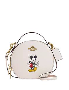 Smooth leatherTwo credit card slotsDouble zip closure, fabric liningTop handle with 1 1/4" dropDetachable strap with 23 1/4" drop for shoulder or crossbody wear6 3/4" (L) x 6" (H) x 2 1/2" (W)Disney x Coach©DisneyStyle No. CM856Color: Chalk Multi Coach Disney, Coach New York, Disney Shop, Coach Outlet, Coach Leather, Disney Style, Leather Crossbody Bag, Coach Bags, White Leather