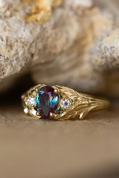 READY TO SHIP: Wisteria in 14K yellow gold, pear alexandrite 7x5 mm, moissanites, RING SIZE 4.5-6.5US | Eden Garden Jewelry™ Eden Garden, Gold Color Combination, Alexandrite Engagement Ring, Alexandrite Ring, Engagement Style, Jewelry Business, Wisteria, Metallic Accents, Vintage Engagement Rings