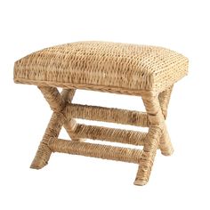 a wicker bench with an upholstered seat and back rest on white background