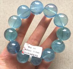 Material:Natural aquamarine beads size :Approx 17mm (Because it is measured manually, the size may vary, 0.5mm-1mm)and the size of each bead is exactly the same. If you mind, please do not buy it. Thank you for understanding   color:blue quantity: one strand  6mm approx 29 pcs one strands 7mm approx25 pcs one strands 8mm approx 22 pcs one strands 9mm approx 21pcs one strands 10mm approx 19 pcs one strands 11mm approx 18pcs one strands 12mm approx 16 pcs one strands 13mm approx 16 pcs one strands Light Blue Aquamarine Bracelets, Blue Aquamarine Beaded Bracelets As Gift, Handmade Light Blue Aquamarine Bracelets, Aquamarine Gemstone Beads Bracelets, Light Blue Aquamarine Beaded Bracelets For Gift, Light Blue Aquamarine Beaded Bracelets As Gift, Handmade Blue Aquamarine Beaded Bracelets, Light Blue Crystal Bracelet With Round Beads For Gifting, Aquamarine Bracelet Beads