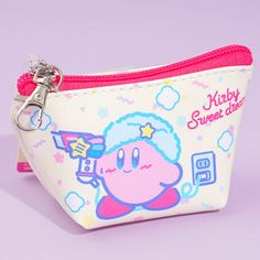 a pink and white coin purse with a cartoon character on it