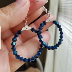 Handmade Hoops, Made With Swarovski Crystal Elements And Silver Tone Hardware. I Used 4mm Bicones In A Stunning Metallic Blue Color! Size 30mm (1.25") Brand New With Tags. Will Come In An Organza Drawstring Gift Bag. Matching Necklace Also Available In My Closet! Smoke Free And Pet Free Home. #Swarovski #Crystal #Hoop #Hoops #Earrings #Blue #Metallic #Unique #Handmade #Party #Cruise #Datenight Blue Nickel-free Hoop Earrings For Party, Blue Round Beads Crystal Earrings For Gift, Luxury Handmade Blue Hoop Earrings, Nickel-free Blue Hoop Earrings For Festivals, Blue Round Crystal Earrings In Metal, Nickel-free Blue Metal Hoop Earrings, Swarovski Jewelry Earrings, Nickel-free Blue Hoop Earrings For The Beach, Blue Crystal Earrings