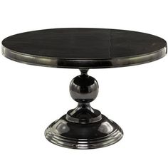 a round table with black top and metal base on an isolated white background for use as a centerpiece