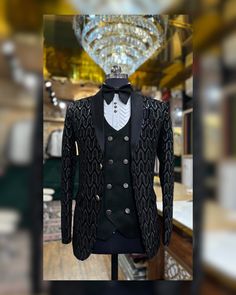 Make an edgy statement with our designer BLACK EMBROIDERED SUIT designed thoughtfully for the modern Indian man. A fusion staple fit for every occasion, adds the right amount of cultural twist to the western silhouette. Color: Black  Garment Type: tuxedo Neck: Mandarin Collar Fabric: Micro Velvet Embroidery: Zari work with sequin embroidery The Product Price is inclusive of: 1 tuxedo, 1 shirt, 1 vest coat and 1 Trouser Style Bottom Product color may slightly vary due to photographic lighting sources or your screen settings. ~We provide fully stitched outfits as per your measurements ~Outfits can be customised in any colours For customisation please contact  ~We provide worldwide shipping ~You choose we design. ~High quality dresses no replicas only hand embroidery ~Image is only for refere 3 Piece Suit Men Wedding, Designer Tuxedo, Indian Jackets, Dog Wedding Outfits, Groom Dress Men, Formal Men Outfit, Mens Kurta Designs, High Quality Dress, Vest Coat