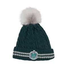 PRICES MAY VARY. EXPERIENCE THE MAGIC OF HARRY POTTER: perfect to keep you warm, you will appreciate this pom pom beanie from Cinereplicas which will turn you into a wizard straight out of Slytherin in no time. AN OFFICIAL PRODUCT: this pom pom beanie is a product licensed by Warner Bros Harry Potter. It is a authentic replica of accessories worn by the actors in the Harry Potter movies. Perfect to put yourself in the shoes of Harry, Hermione or Ron! PREMIUM QUALITY: this pom pom beanie hat is d Harry Potter Beanie, Student Costume, Film Harry Potter, Slytherin Fashion, Cool Beanies, Harry Potter Shop, Harry Potter Cosplay, Slytherin Harry Potter, Harry Potter Merchandise