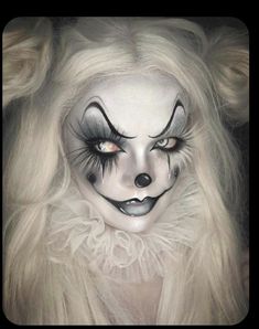 a close up of a person wearing makeup and hair with long blonde hair, dressed as a clown