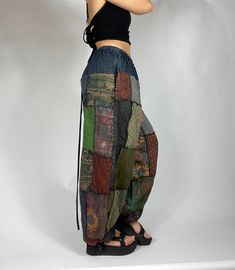 Bohemian mixed patchwork hippie pants in dark blue/ mixed color patches. Each pair is slightly unique and will have some different patches and colorings!. Waist stretches from 24-35' inches comfortably. Model is 5'2 for reference. Measurements: Inseam: 31’ Waist: 24’ to 35’ Earthy Outfits, Waist Stretches, Hippie Pants, Patch Work, Art Characters, Fairy Grunge, Clothing Styles, Harem Pants, Concept Art