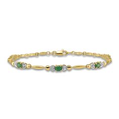 Mesmerizing oval-cut natural emerald gemstones are flanked by shimmering round diamond accents within heart-shaped settings in this meaningful women's bracelet. Fashioned in 14K yellow gold, the 7-inch bracelet secures in place with a lobster clasp. Eternity Bracelet, Gold Book, Bracelet Diamond, Emerald Bracelet, Jared The Galleria Of Jewelry, Emerald Stone, Gold Price, Emerald Gemstone, Diamond Bracelets