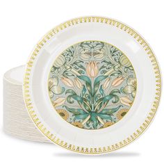 a stack of white plates with gold trimmings and floral designs on the side