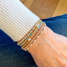 Stacked beaded bracelets with 14k gold fill balls Cute Seed Bead Bracelets Ideas, Beaded Bracelet Stacks, Dainty Beaded Bracelets, Beaded Bracelets Diy Ideas, Small Beaded Bracelets Diy, Small Bead Bracelets Ideas, Small Beaded Bracelets, Pretty Stacks, Bracelet Stack Ideas