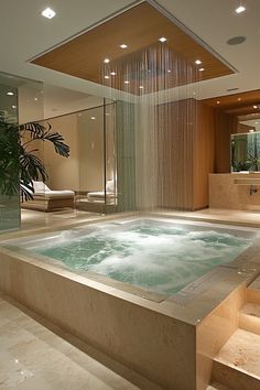 an indoor jacuzzi tub in a modern bathroom