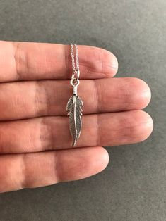 Silver Tiny Mini Feather Necklace - Sterling Silver Color : Silver Material : Sterling Silver Feather Size : 28mm * 6mm Chain Length : 16 inches / 18 inches / 20 inches * Metal components are Sterling Silver. * Suitable for delicate and sensitive skin. * Comes in a jewelry box. If you need extra boxes for gifting....just let us know! Adjustable Feather Necklace As Gift, Mini Sunflowers, Feather Necklace, Silver Feather, Feather Necklaces, Silver Prices, Necklace Sterling Silver, Silver Material, Sterling Earrings