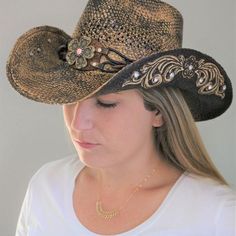 The Bittersweet Stampede Women's Straw Western Hat features a teardrop shape crown with vent holes to keep things light and airy. It’s made from genuine Panama straw which gives it a light yet high-quality sturdy feel. The upturned brims are decorated with rhinestone and light floral patterns and the band features straps accentuated with a flower center buckle. The interior is also fitted with sweatband for a comfortable fit. Features 100% genuine Panama straw Teardrop style crown Rhinestone and Western Hat Styles, Western Hats For Women, Cowboy Hats Women, Trending Hats, Cowgirl Style Outfits, Cowgirl Look, Hat Bands, Straw Cowboy Hat, Cute Country Outfits