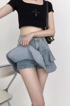 Take any outfit to the next level with this Tiered Pleated Denim Mini Skirt! With its pleated tiers and lightweight denim, you can wear this skirt with a variety of tops and styles. You can pair it with your favorite shirts and blouses or even wear it as is—with its built in short under, you'll stay comfortable all day long. Step out in style by completing the look with flats, sandals, sneakers or boots.
Gender: WomenMaterial: Cotton, Denim, PolyesterLength: Above Knee / MiniWaist: High-WaistClo High Waist Cotton Denim Skirt With Ruffles, Denim Ruffled Skirt For Spring, Casual Pleated Tiered Skirt Bottoms, Casual High Waist Ruffled Denim Skirt, Trendy Cotton Denim Skirt With Ruffles, Trendy Ruffled Denim Skirt For Spring, Trendy High Waist Shorts With Ruffled Skirt, Trendy Ruffled Skort, Trendy Cotton Ruffled Denim Skirt