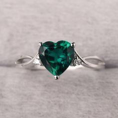 ◆ The ring is handcrafted from sterling silver and decorated with a dazzling 8*8 mm emerald and CZs. It is suitable for engagement/anniversary/daily occasion. ◆ Production Description: Main stone Type: Lab Emerald Main Stone Shape: Heart Cut Main Stone Size: 8*8 mm(1.59ct) Side stone: CZ Metal: 925 Sterling silver - Other options available in the drop down menu ◆ Customization: √Free for Add Engraving √Other Metal Type Available √Other Gemstones & Shapes Available √Personalization Requests Avail Fine Jewelry Green Heart Ring For May Birthstone, Green Heart Ring For May Birthstone, Fine Jewelry Style, Heart Cut Diamond Emerald Ring For Wedding, Green Heart Ring For May Birthstone, Elegant Heart Cut Emerald Wedding Ring, Fine Jewelry Green Heart Shaped Ring, Heart-shaped Green Emerald Ring For May Birthstone, Green Diamond Heart Cut Ring, Heart Shaped Green Emerald Ring For May Birthstone