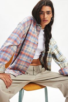 Elevated essential BDG shirt in an oversized, boxy fit. Designed in a soft cotton flannel featuring a collared neckline, button-down front, long sleeves and a curved hem. Topped with a chest pocket. Exclusively at Urban Outfitters. Features BDG Dani oversized flannel shirt Slouchy flannel shirt jacket Soft brushed cotton flannel Collared neckline and long sleeves with buttoned cuffs Front chest pocket Button-down front Curved hem Boxy, oversized fit Tunic length Button closure UO exclusive Conte Relaxed Fit Collared Flannel Shirt For Spring, Relaxed Fit Flannel Shirt With Button Closure For Spring, Spring Relaxed Fit Flannel Shirt With Button Closure, Spring Flannel Shirt With Relaxed Fit, Trendy Relaxed Fit Flannel Shirt, Trendy Flannel Button-up Shirt, Oversized Flannel Collared Shirt, Oversized Flannel Spring Tops, Oversized Flannel Top For Spring