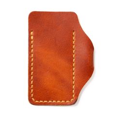 a brown leather case with stitching on it