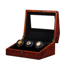 Classic watch winder case designs are timeless. The sloped front case design affords perfect visibility. The top is fitted with a beveled glass viewing panel and superb quadrant hinges. All interior surfaces are lined in rich suede. Drive modules simply lift out to load batteries (which are optional). Multiple layers of high gloss polyester lacquer enrich the finished case, available in two different wood materials. The bottom surface of the case is covered in suede to prevent damage to fine fur Luxury Self-winding Watch As A Gift, Watch Winder, Home Safes, Classic Watches, Beveled Glass, Siena, High Gloss, Classic Design, Teak