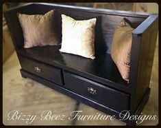 a wooden bench with pillows on top of it and the words, bizzy bee furniture designs