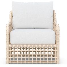 a wicker chair with a white cushion