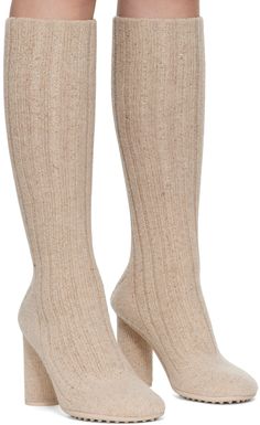 Mid-calf rib knit wool- and silk-blend boots in beige. · Covered block heel with rubber injection · Treaded bio-based rubber sole · Heel: H3.5 Supplier color: Dune melange Beige Mid-calf Heeled Boots For Fall, Winter Beige Mid-calf Boots With Reinforced Heel, Beige Heeled Boots With Reinforced Heel For Winter, Winter Beige Heeled Boots With Reinforced Heel, Mid Calf, Bottega Veneta, Atom, Block Heels, Rib Knit