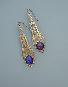 "Vintage Jewelry - Art Deco Earrings - Purple Earrings - Brass jewelry - Dragon's Breath Earrings - Chloe's Vintage Handmade Jewelry Awesome vintage brass Art Deco earrings embellished with gorgeous purple fuschia Dragon's breath glass stones. The brass has a soft warm patina. Chloe says, Wear them and feel fabulous!\" They measure 2 1/4\" long from the top of the ear wire. Thanks for visiting Chloe's" Artistic Purple Jewelry With Matching Earrings, Nickel-free Art Deco Metal Earrings, Artistic Nickel-free Purple Jewelry, Artistic Purple Nickel-free Jewelry, Art Deco Style Matching Metal Earrings, Handmade Art Deco Silver Earrings, Handmade Silver Art Deco Earrings, Handmade Art Nouveau Drop Earrings, Art Deco Pierced Metal Jewelry