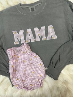 Seriously obsessed! The perfect way to hold those baby outfits close to your heart. You will ship us your outfit(s) and we will use those as the fabric for the MAMA print.  ❤️  Ordering process: 1. Complete order details in personalization box and drop downs 2. Place Order 3. You will receive our address for shipment within 24 business hours of purchase, if purchased on the weekend it will be sent Monday  4. Mail outfit(s) - PLEASE KEEP tracking number as we are unable to individually check for Mom Applique Shirts, Hand Embroidered Mama Sweatshirt, Mama Sweatshirt With Baby Clothes, Embroidered Mama Shirt, Mama Onesie Sweatshirt, Mama Tee, Simple Shirts, Mama Shirt, Sweatshirts Women