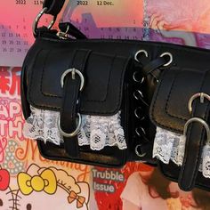 𝔇𝔢𝔱𝔞𝔦𝔩𝔰: Style: Egirl, Kawaii, Kawaii Goth Material: Pu leather Length: 26cm*5.5cm* 13cm Chain Length:33 cm This bag features a lace patchwork design. It can match your kawaii wardrobe & help you carry small personal belongings Enjoy free shipping with the purchase of over 80$ Harajuku Style Black Shoulder Bag For Everyday Use, Black Harajuku Shoulder Bag For School, Black Harajuku Style Shoulder Bag For School, Cute Black Shoulder Bag For Party, Y2k Style Black Party Bag, Cute Black Rectangular Satchel, Cute Black Shoulder Bag With Mobile Phone Pocket, Cute Black Large Capacity Satchel, Cute Black Satchel With Large Capacity