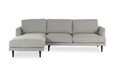 a gray couch with a chaise lounger on it's back and footrests